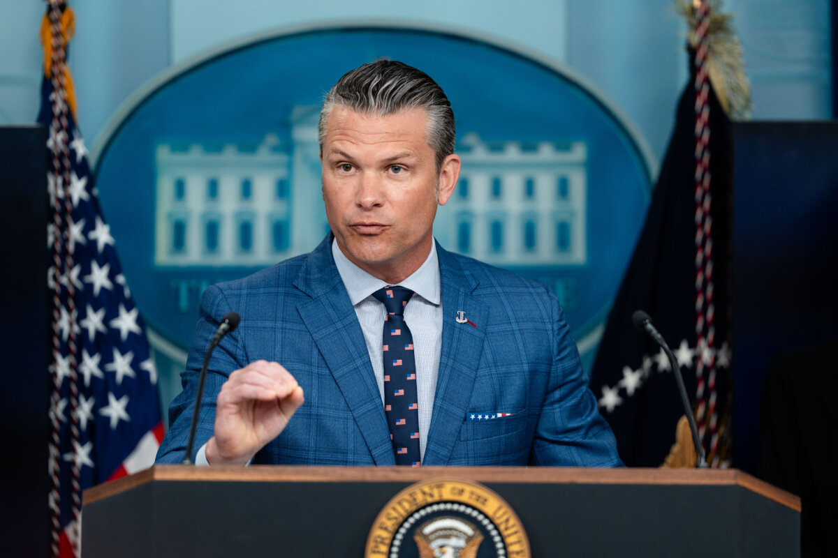 Defense Secretary Pete Hegseth speaks during a news briefing at the White House on Aug. 11, 2025. (Madalina Kilroy/The Epoch Times)