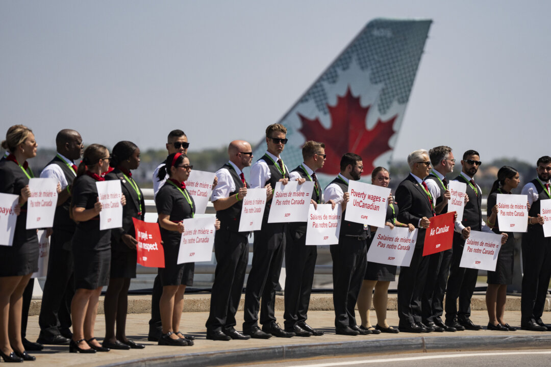 Air Canada Flight Attendants Near Strike With 99.7% Vote