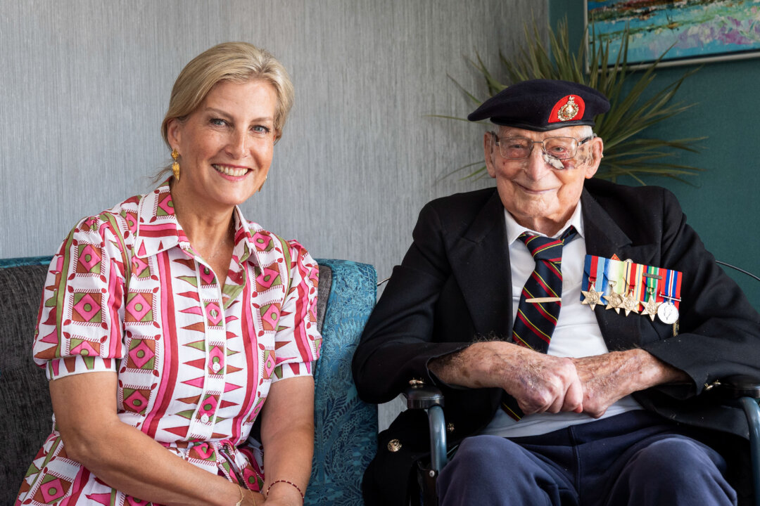 NextImg:Day in Photos: 105-Year-Old Royal Marines Veteran, Heatwave in Europe, and Grouse Hunting Season