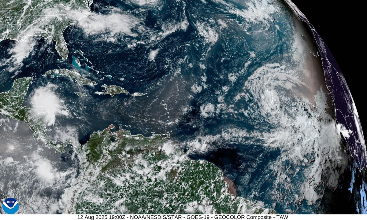 Tropical Storm Erin (R) builds in the Atlantic Ocean as it heads for the Caribbean Sea on Aug. 12, 2025. (NOAA/NESDIS/STAR - GOES - 19)