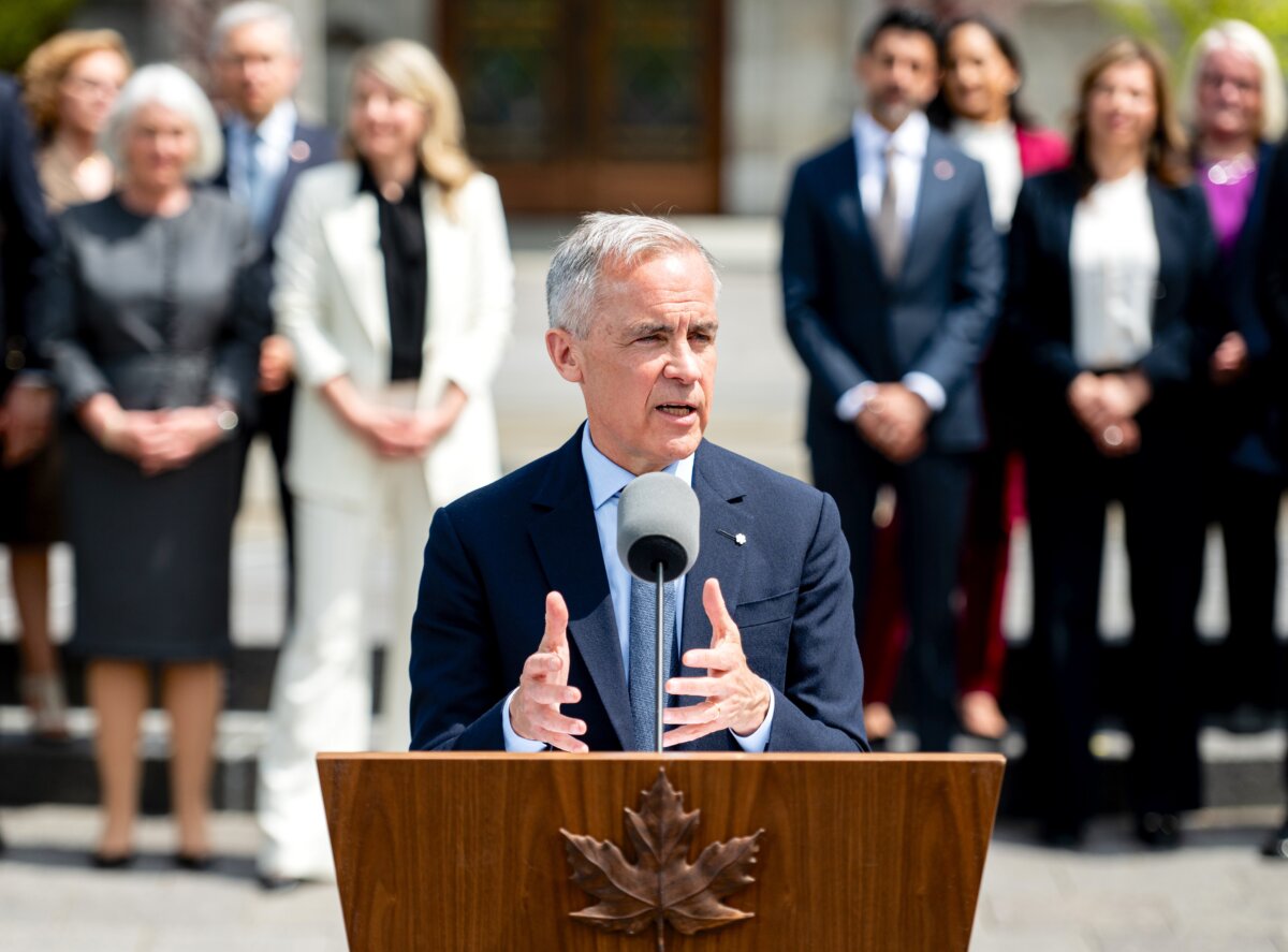Prime Minister Mark Carney speaks to reporters following a swearing in ceremony at Rideau Hall in Ottawa on May 13, 2025. (The Canadian Press/Spencer Colby)