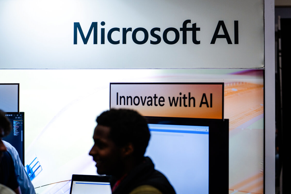 A sign for Microsoft at an event booth in Washington on June 2, 2025. (Madalina Vasiliu/The Epoch Times)