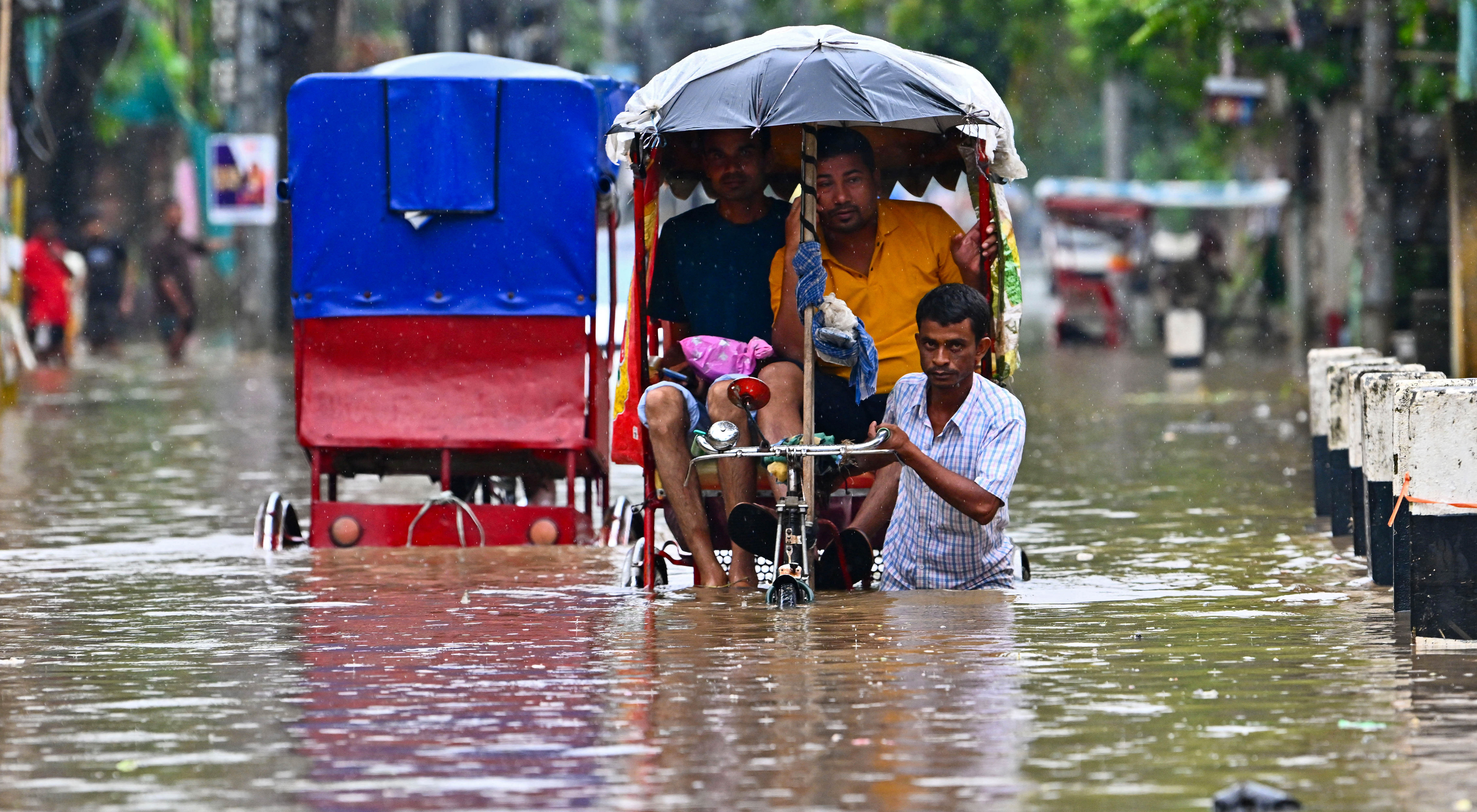 Day in Photos: Floods In India, Wildfire in Greece, and Sailing Ship Festival