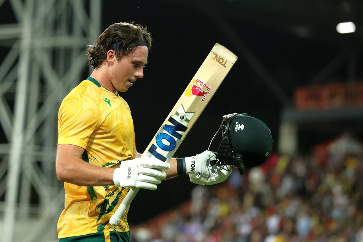 Dewald Brevis of South Africa raises his bat as he leaves the ground on 125 not out during game two in the T20 International series between Australia and South Africa at Marrara Stadium in Darwin, Australia on Aug. 12, 2025. (Robert Cianflone/Getty Images)