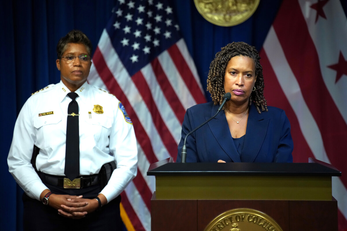 Washington Mayor Muriel Bowser (R), joined by Chief of Police at the Metropolitan Police Department Pamela Smith, speaks at a press conference after President Donald Trump announced a federal takeover of the Metropolitan Police Department at the Wilson Building in Washington on Aug. 11, 2025. (Kevin Dietsch/Getty Images)