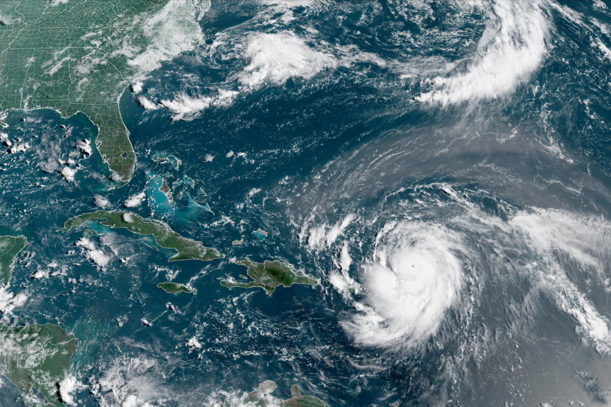 Hurricane Erin, which is the first hurricane of the 2025 Atlantic season and has developed into a dangerous Category 4 hurricane, moves westward near Puerto Rico in a composite satellite image on Aug. 16, 2025. (CIRA/NOAA/Handout via Reuters)