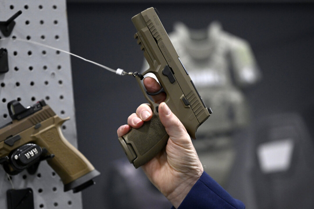 Injured Canadian Soldier Suing Federal Government, US Gunmaker Over Accidental Pistol Discharge