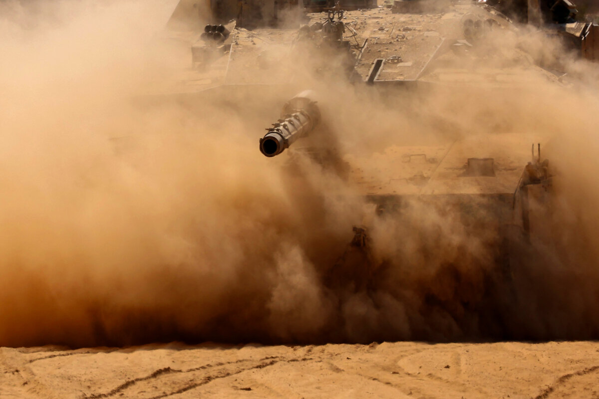 An Israeli tank near Israel's border fence with the Gaza Strip on Aug. 19, 2025. (Jack Guez/AFP via Getty Images)