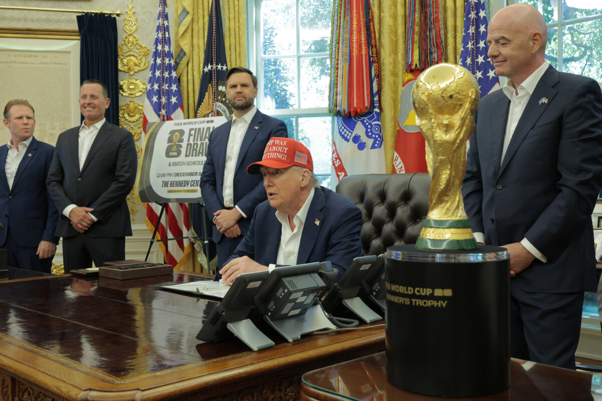 President Donald Trump speaks in the Oval Office while FIFA President Gianni Infantino (R), and Vice President JD Vance (3rd L) look on, on Aug. 22, 2025. (Chip Somodevilla/Getty Images)