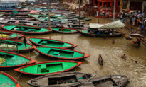 Day in Photos: Floods in India, Anniversary of Mass Knife Attack, and Corgi Race