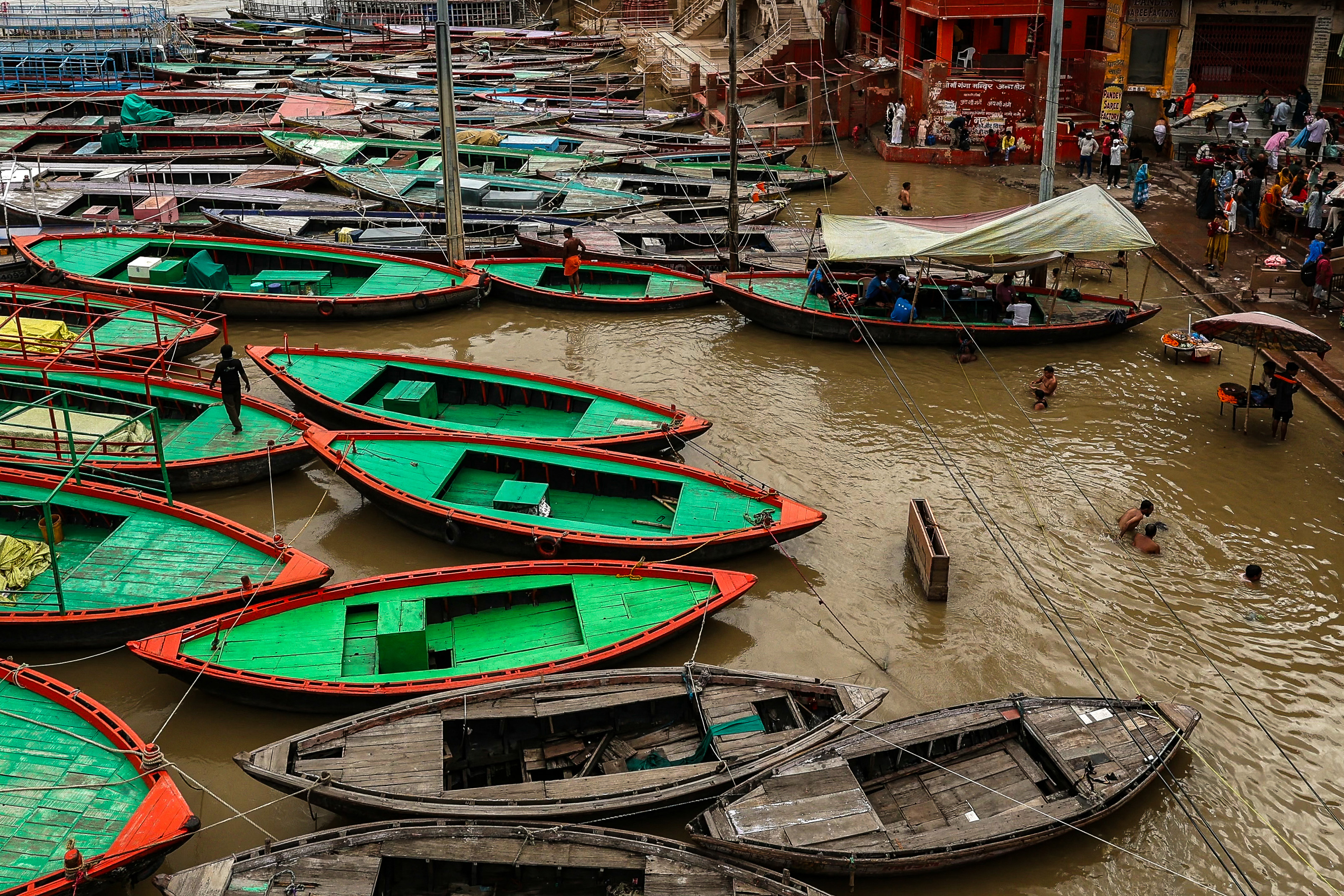 Day in Photos: Floods in India, Anniversary of Mass Knife Attack, and Corgi Race
