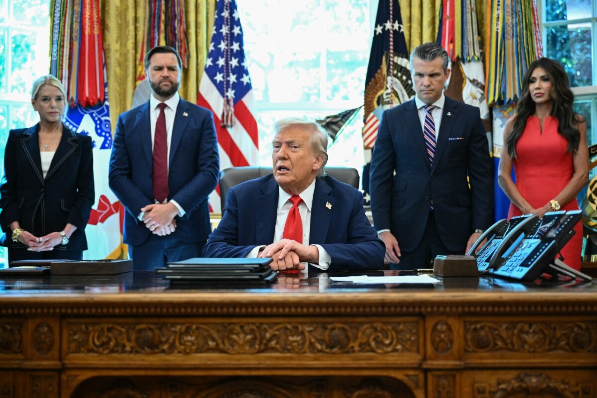 Attorney General Pam Bondi (L), Vice President JD Vance (2nd L), Defense Secretary Pete Hegseth (2nd R) and Secretary of Homeland Security Kristi Noem (R) look on as President Donald Trump (C) speaks to the press before signing an executive order that aims to end cashless bail, in the Oval Office of the White House, on Aug. 25, 2025. (Mandel Ngan/AFP via Getty Images)