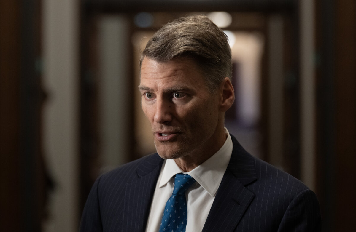 Minister of Housing and Infrastructure Gregor Robertson speaks with media before appearing at the House of Commons transport committee on Parliament Hill in Ottawa, Aug. 1, 2025. (The Canadian Press/Adrian Wyld)