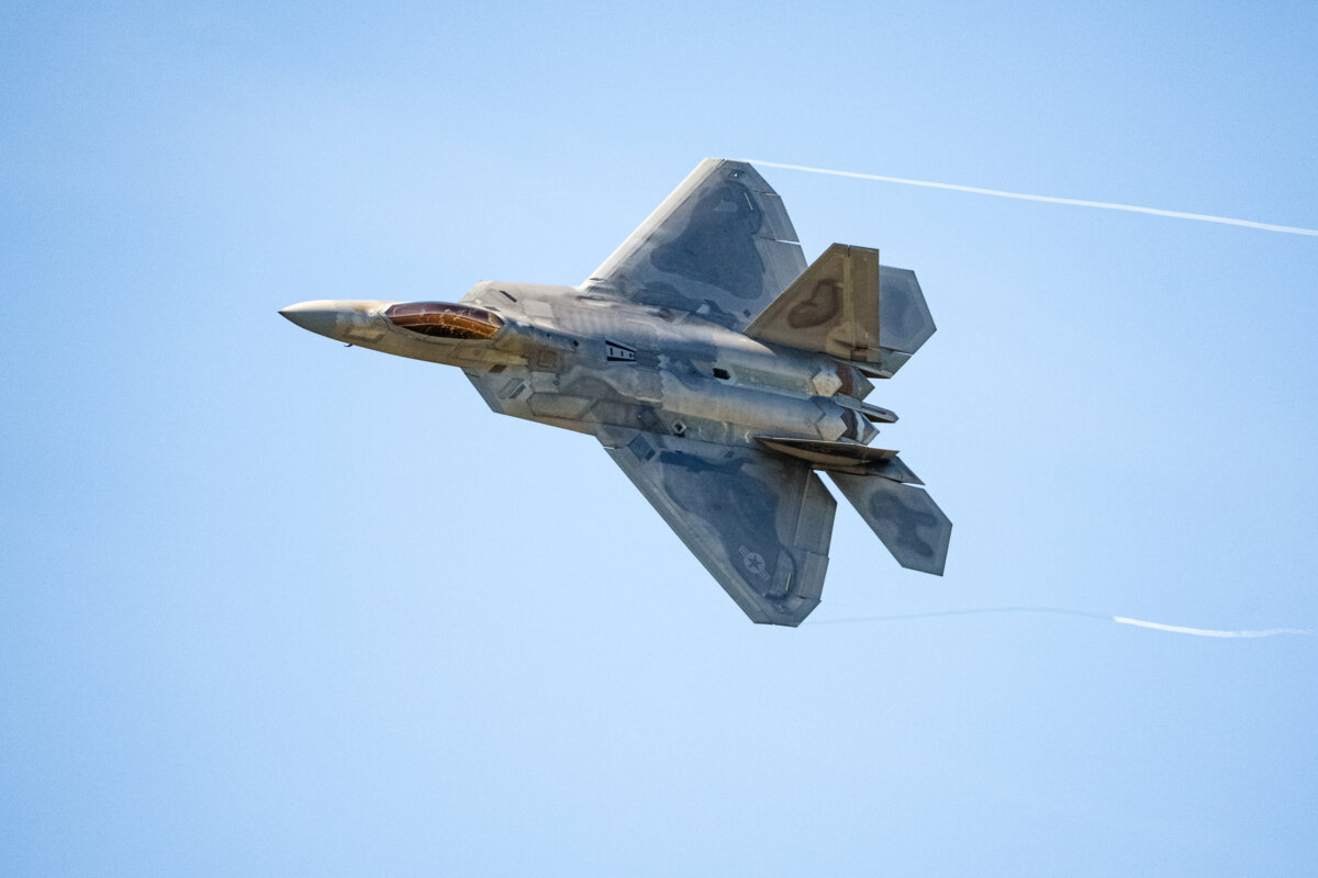 An F-22 Raptor flies at the Air Dot Show Tour at the Orange County Airport in Montgomery, N.Y., on Aug. 23, 2025. (Larry Dye/The Epoch Times)