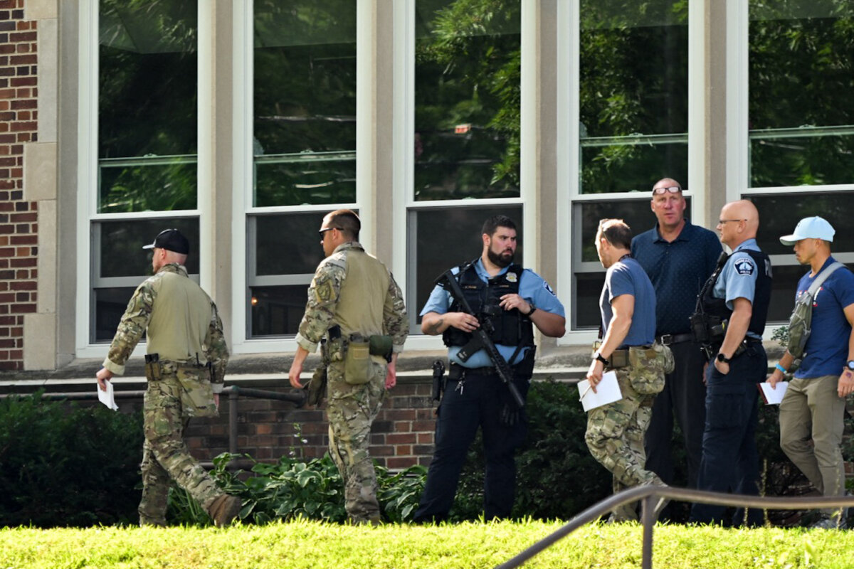 Law enforcement officers work at the scene of a shooting at Annunciation Catholic School in Minneapolis, on Aug. 27, 2025. (Tom Baker/AFP via Getty Images)