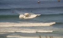 Yacht-Sized Passenger Boat Runs Aground in High Surf Off Hawaii Beach