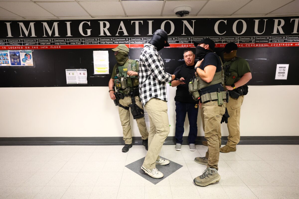 Federal agents patrol the halls of immigration court at the Jacob K. Javits Federal Building in New York City on Aug. 6, 2025. (Michael M. Santiago/Getty Images)