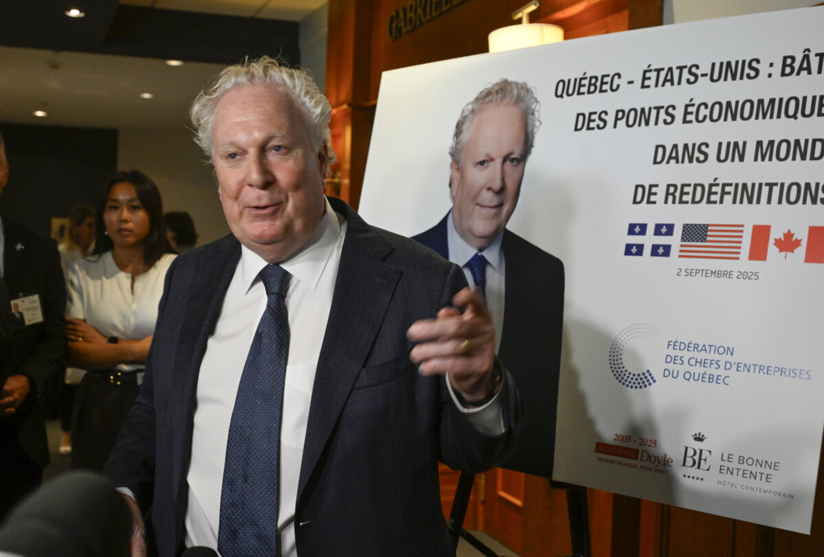 Former Quebec premier Jean Charest speaks to reporters at a business luncheon on relations with the United States, in Quebec City, on Sept. 2, 2025. (The Canadian Press/Jacques Boissinot)