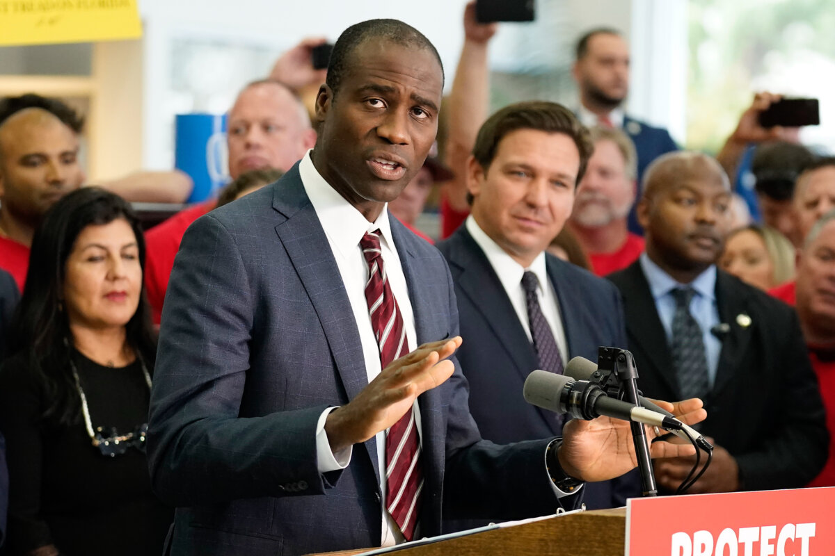 Florida Surgeon General Dr. Joseph Ladapo gestures as speaks to supporters and members of the media before a bill signing by Gov. Ron DeSantis in Brandon, Fla., on Nov. 18, 2021. (AP Photo/Chris O'Meara, File)