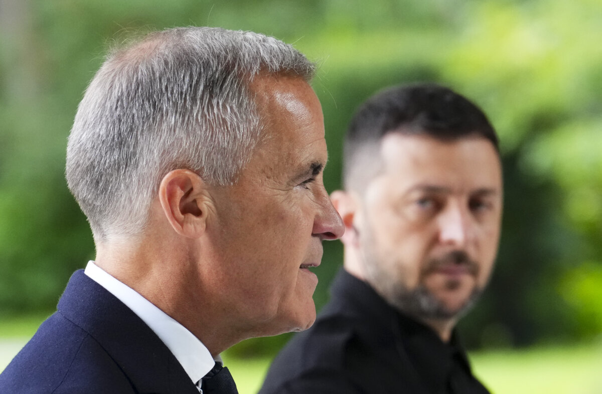 Prime Minister Mark Carney and Ukrainian President Volodymyr Zelenskyy take part in a joint press conference at Mariinskyi Palace in Kyiv, Ukraine on Aug. 24, 2025. (The Canadian Press/Sean Kilpatrick)