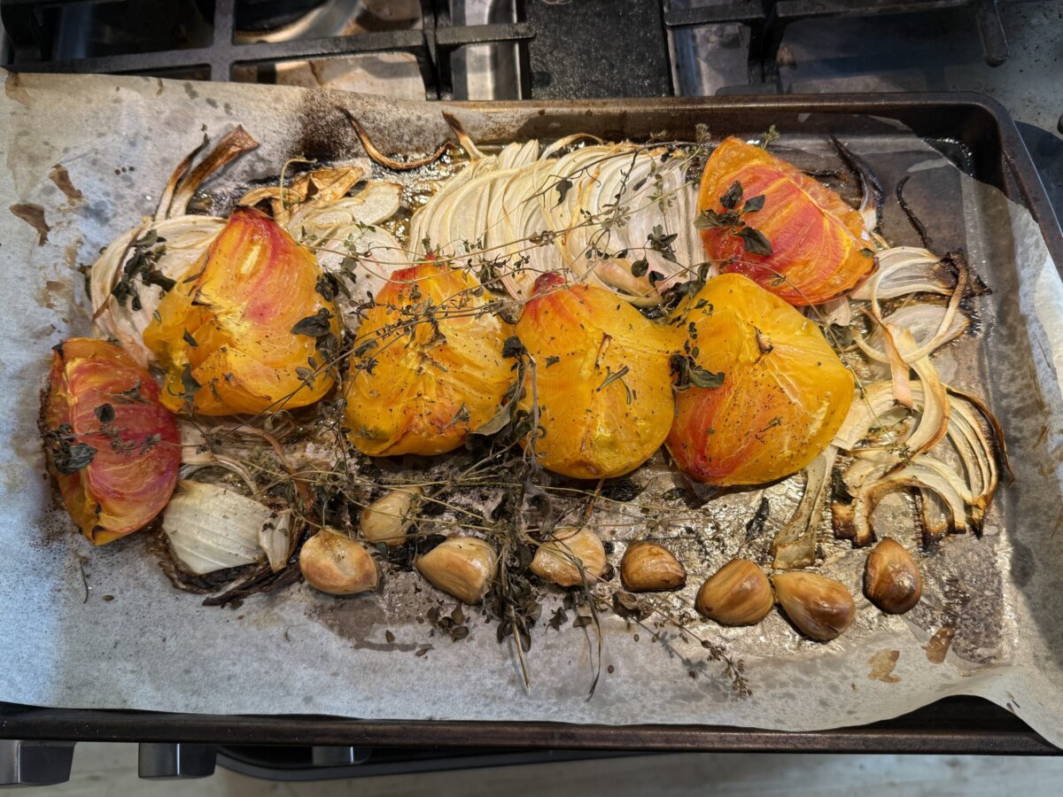 Roasted yellow heirloom tomatoes, garlic, and onions are ready to be blended with basil into a smooth and silky sauce. (Ari LeVaux)