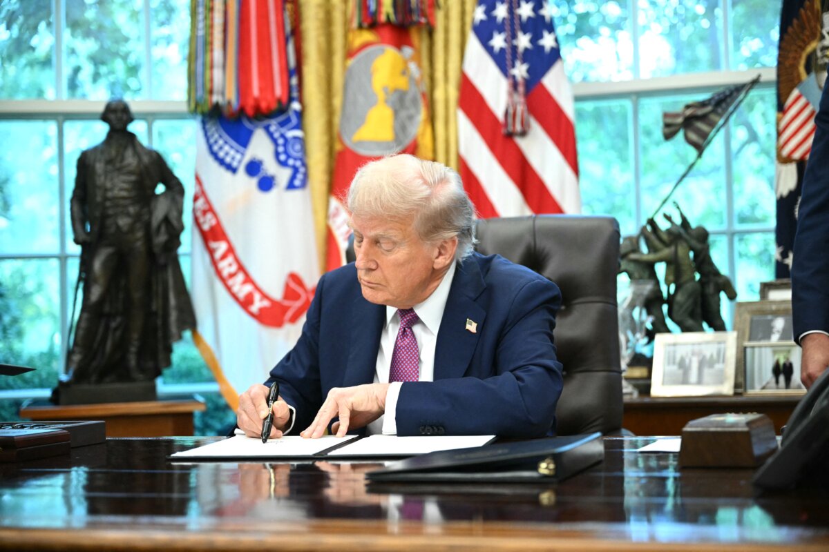 President Donald Trump signs executive orders in the Oval Office of the White House on Sept. 5, 2025. (Mandel Ngan/AFP via Getty Images)