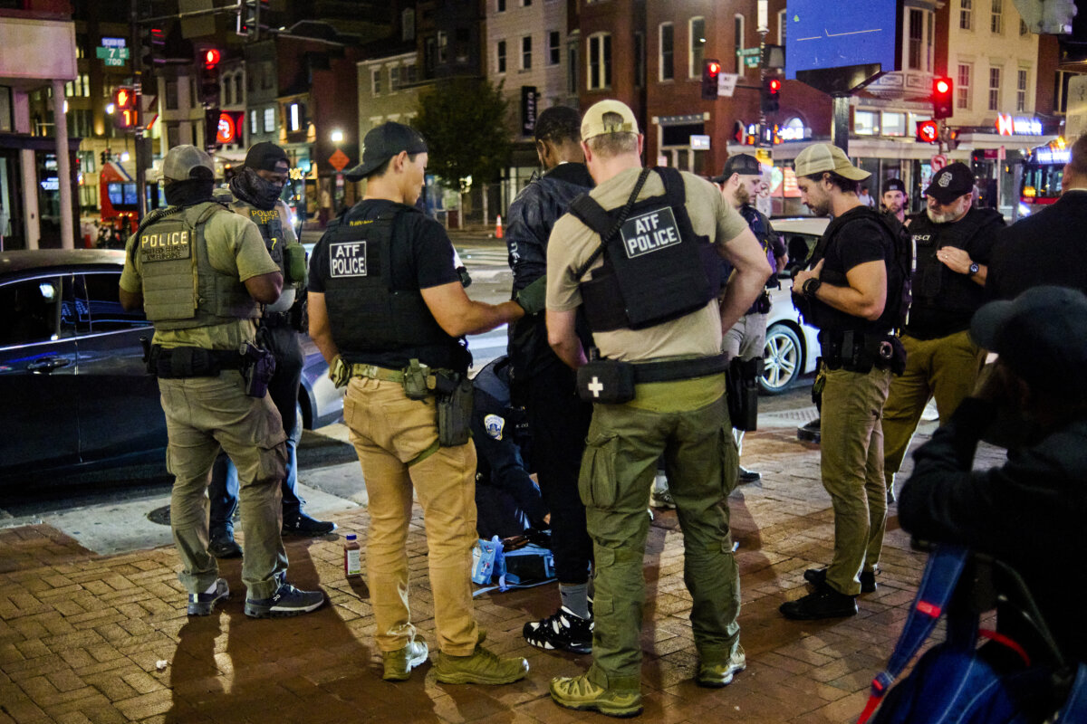 Federal agents arrest a man at the Chinatown Metro Station in Washington on Sept. 3, 2025. (Dominic Gwinn/Middle East Images via AFP via Getty Images)