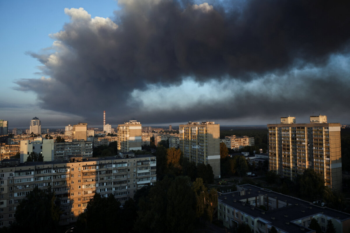 Thick smoke from a nearby strike site fills the sky during a Russian drone strike, in Kyiv, Ukraine, on Sept. 7, 2025. (Thomas Peter/Reuters)