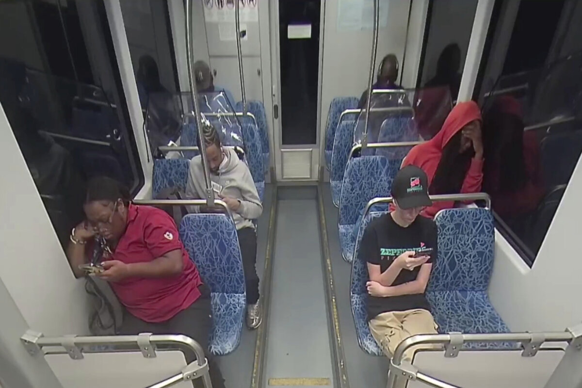 A still from a video shows Iryna Zarutska (Bottom R) before she was fatally stabbed on a commuter train in Charlotte, N.C., on Aug. 22, 2025. (Charlotte Area Transit System via AP)