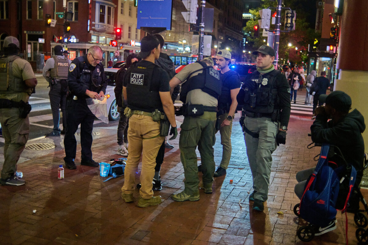 Federal agents arrest a man at the Chinatown Metro Station in Washington on Sept. 3, 2025. (Dominic Gwinn/Middle East Images via AFP via Getty Images)