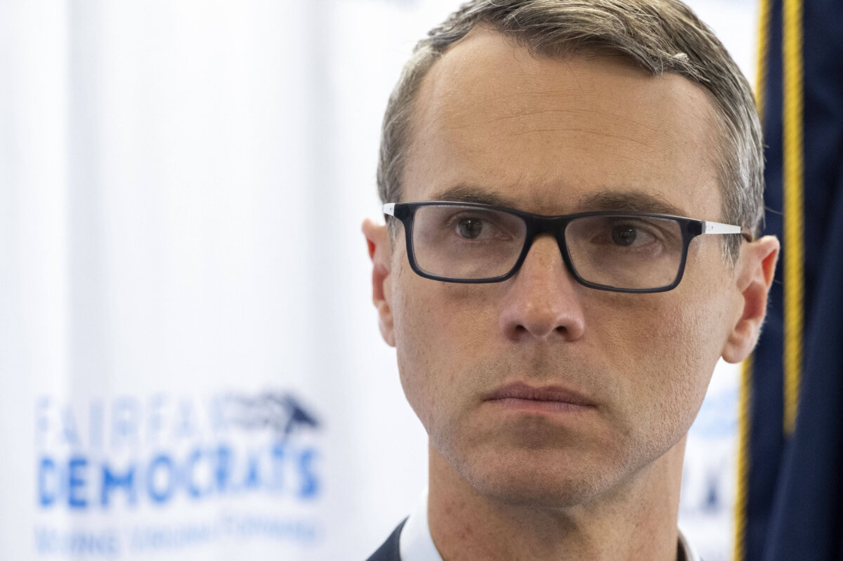 Democratic candidate James Walkinshaw, who is running for the empty 11th congressional seat in Virginia, talks with reporters following a news conference, in Fairfax, Va., on Sept. 5, 2025. (Kevin Wolf/AP Photo)