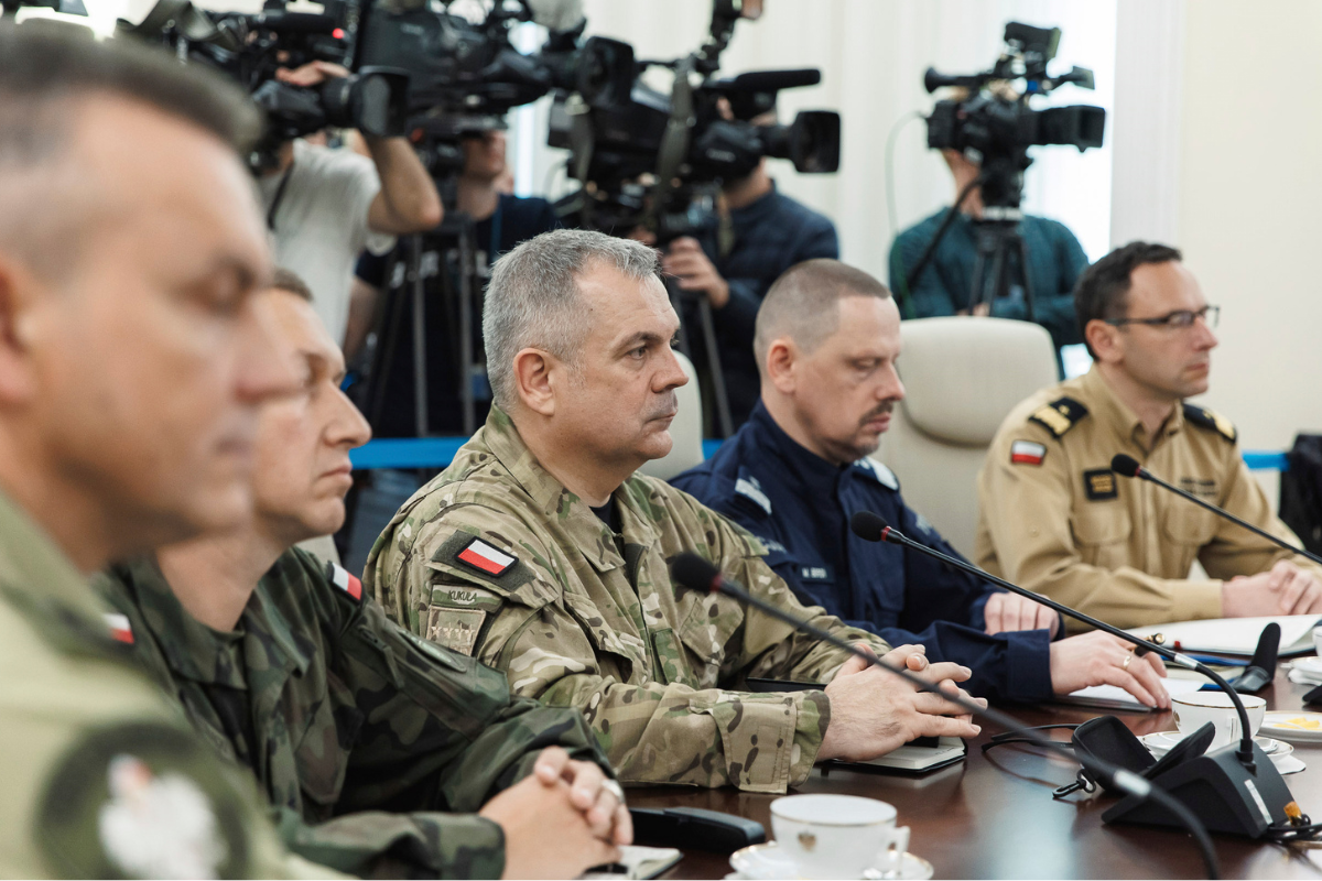 General Wieslaw Kukula, center, chief of the General Staff of the Polish Armed Forces during at the Chancellery of the Prime Minister for an extraordinary government meeting, following violations of Polish airspace during a Russian attack. in Warsaw, Poland, on Sept. 10, 2025. (Chancellery of the Prime Minister of Poland via AP)