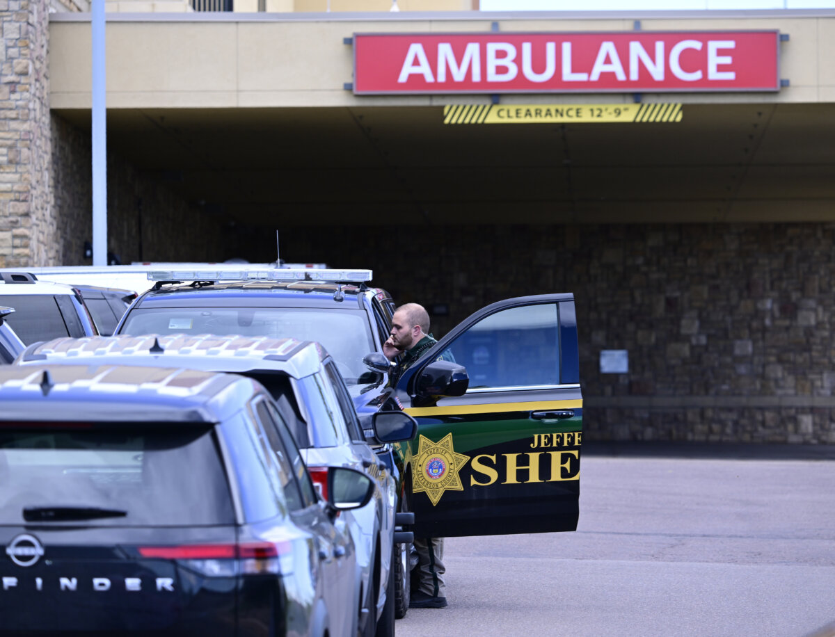 A Jefferson County, Colo., Sheriffs Department deputy is stationed outside of the St. Anthony's Hospital emergency entrance in Lakewood, Colo., on Sept. 10, 2025. (Andy Cross/The Denver Post via AP)