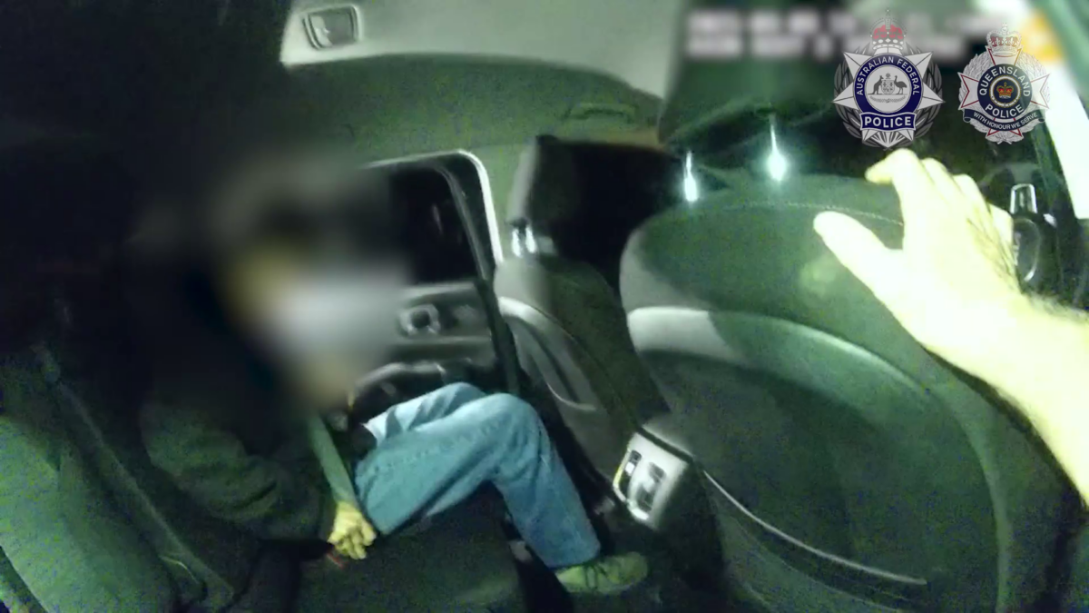 A frame from video of the arrest of 18-year-old Max Belter, who has been charged with two terrorism offences after an investigation by Australian Federal and Queensland P:olice and the Australian Security Intelligence Organisation (ASIO). (Courtesy of Australian Federal Police)