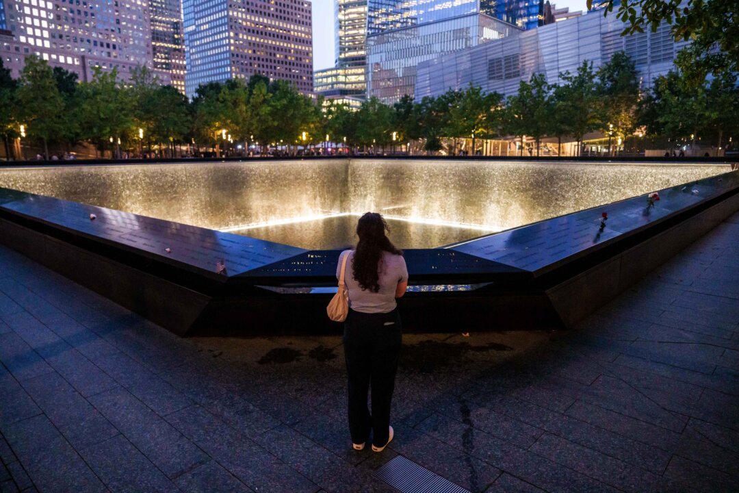 NextImg:Day in Photos: Sept. 11 Anniversary, Pro-Independence March in Spain, and Painted Fields