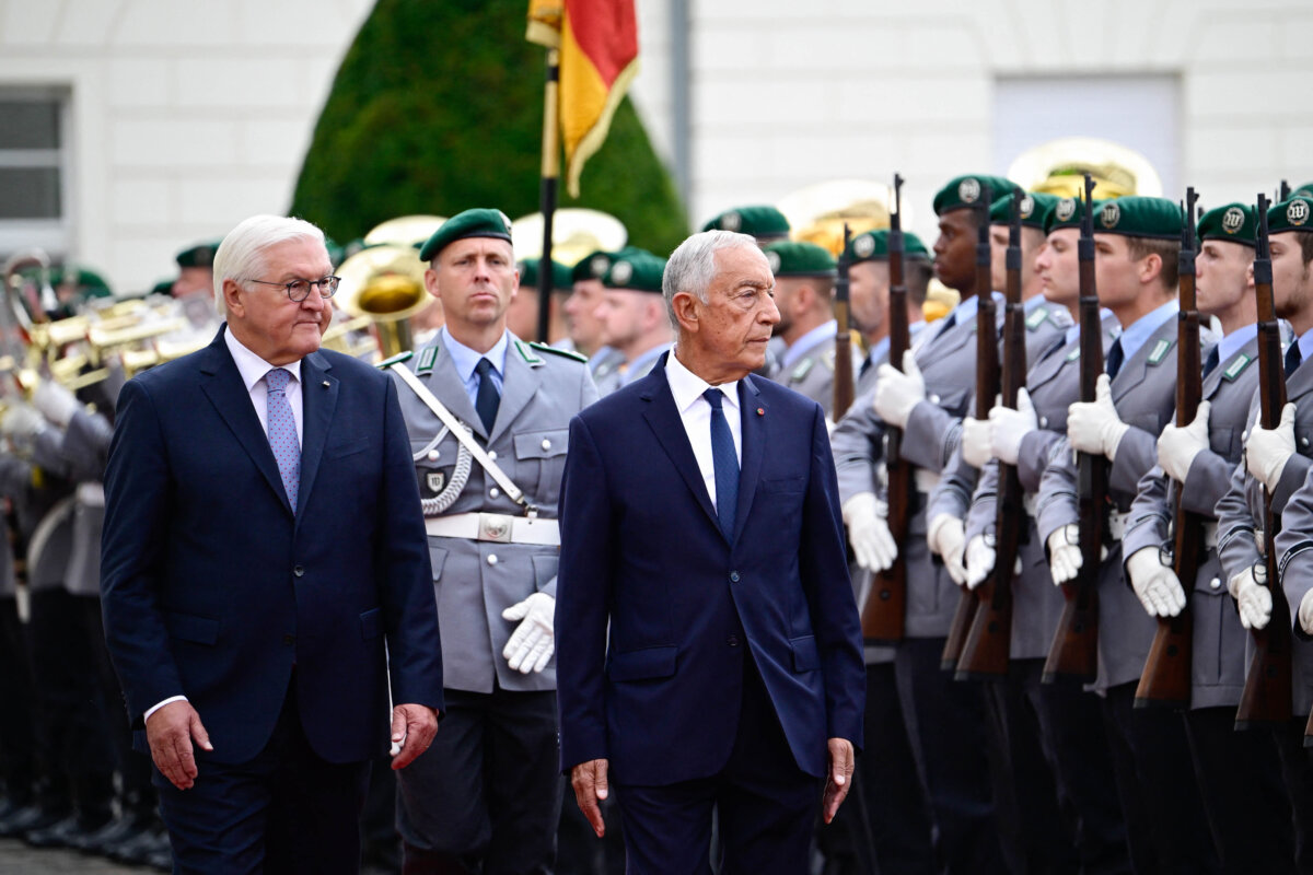 German President Frank-Walter Steinmeier (L) and Portuguese President Marcelo Rebelo de Sousa (R) review a military honor guard in front of the presidential Bellevue Palace in Berlin on Sept. 12, 2025. (Tobias Schwarz/AFP via Getty Images)