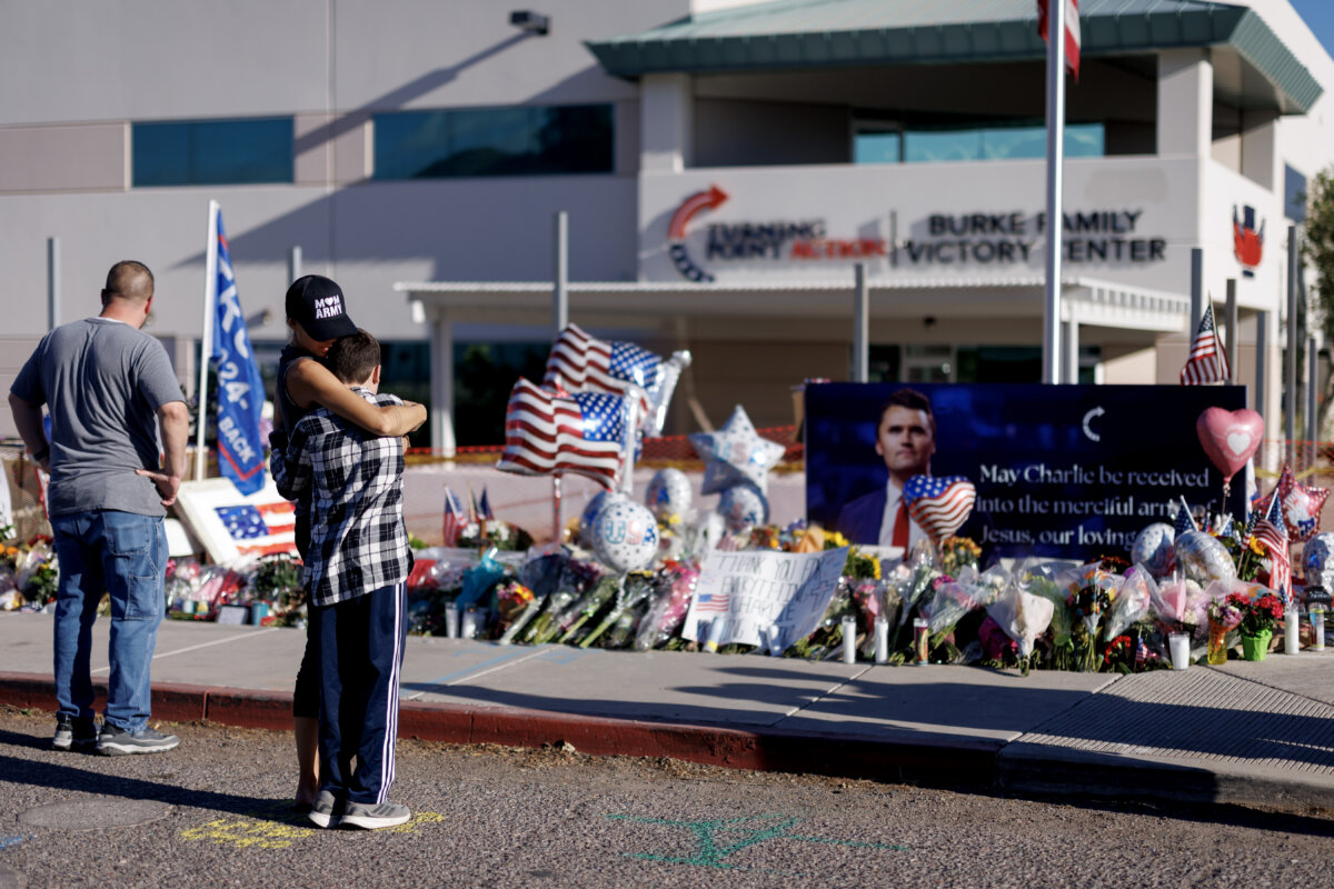 People visit a memorial for Charlie Kirk at the Turning Point USA headquarters in Phoenix, Ariz., on Sept. 12, 2025. (Eric Thayer/Getty Images)
