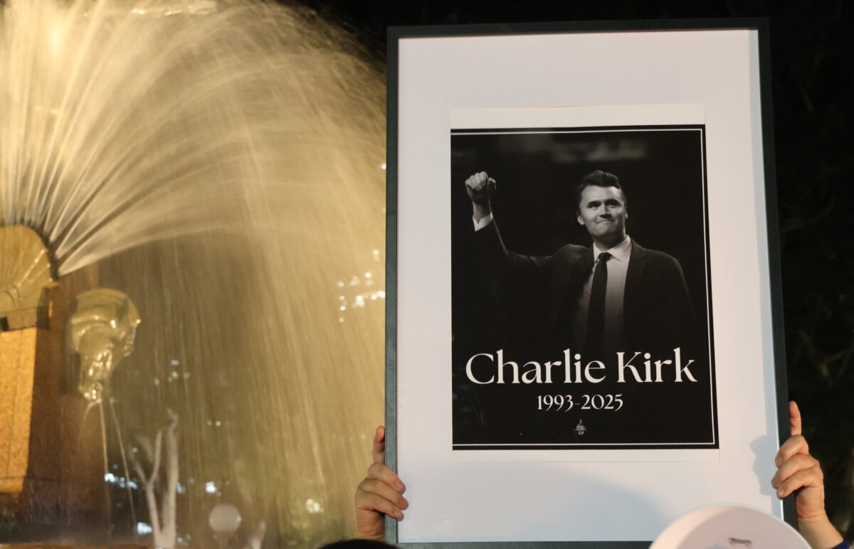 Australians held a vigil night for young American conservative activist Charlie Kirk in Hyde Park of Sydney, Australia on Sept. 12, 2025. (The Epoch Times)