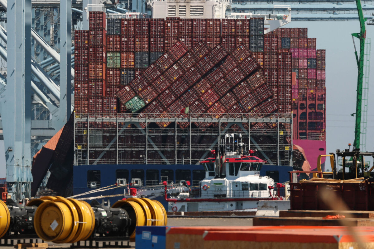 Fallen shipping containers (L) next to stacks of leaning containers on a vessel moored at the Port of Long Beach in Long Beach, Calif., on Sept. 9, 2025. (Patrick T. Fallon/AFP via Getty Images)