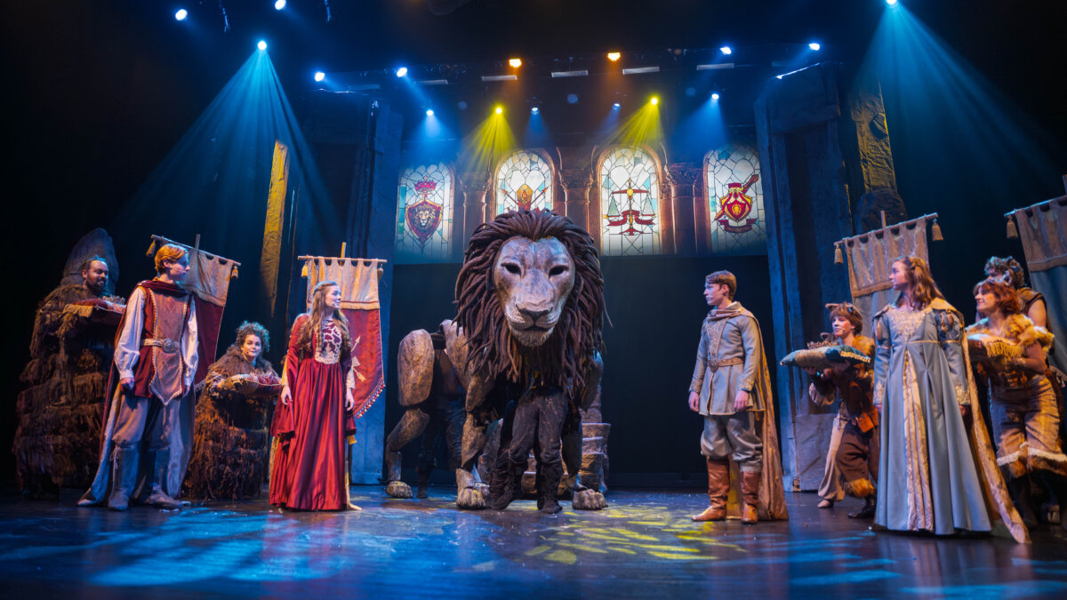 The Pevensie children are crowned kings and queens of Narnia, in "The Lion, the Witch, and the Wardrobe." (The Academy of Arts Logos Theatre)