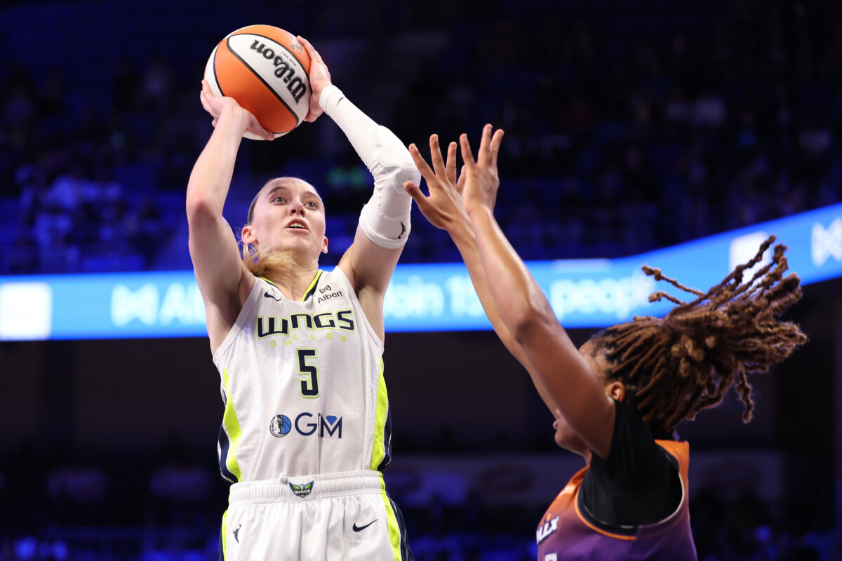 Paige Bueckers of the Dallas Wings shoots over Monique Akoa Makani of the Phoenix Mercury at College Park Center in Arlington, Texas, on Sept. 11, 2025. (Sam Hodde/Getty Images)
