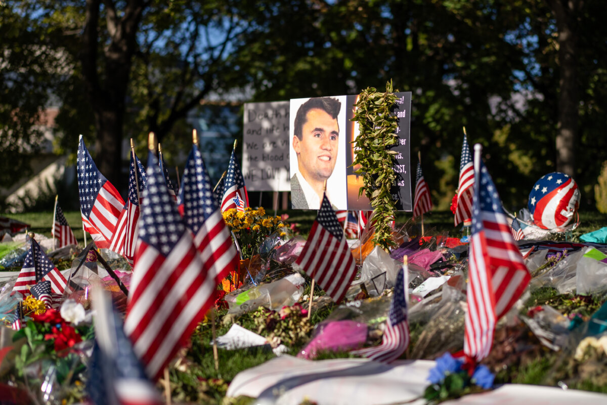 Flowers, American flags, and other items left by mourners of Charlie Kirk at Utah Valley University in Orem, Utah, on Sept. 16, 2025. (Madalina Kilroy/The Epoch Times)