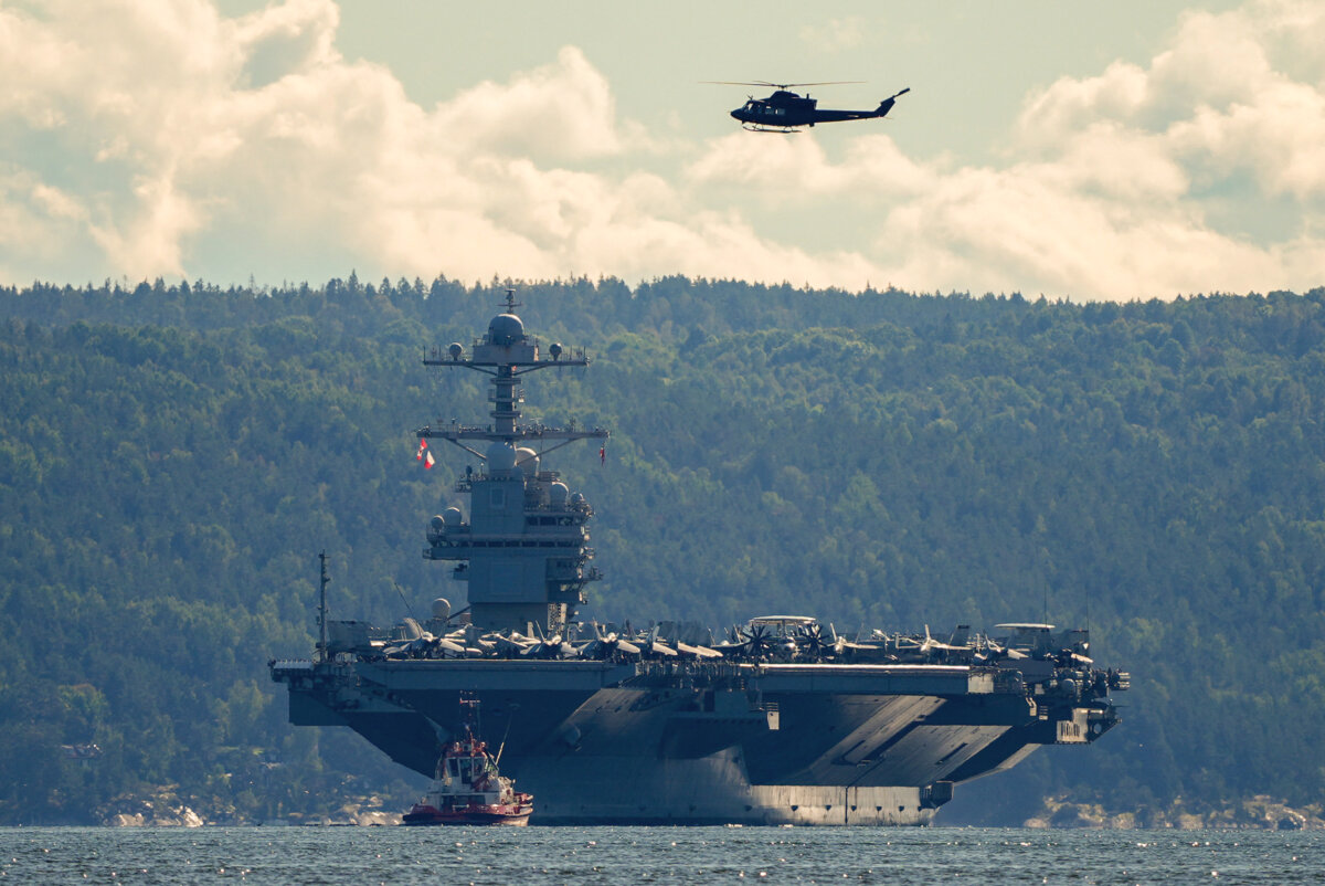The U.S. aircraft carrier USS Gerald R Ford is on its way into the Oslofjord, Oslo, Norway, on Sept. 17, 2025. The ship is the world's largest warship and will be located in the inner Oslofjord. (Lise Åserud/NTB/AFP via Getty Images)