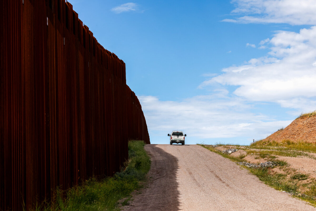 A U.S. Customs and Border Protection vehicle patrols along the U.S.–Mexico border in Nogales, Ariz., on Sept. 17, 2025. (Charly Triballeau/AFP via Getty Images)