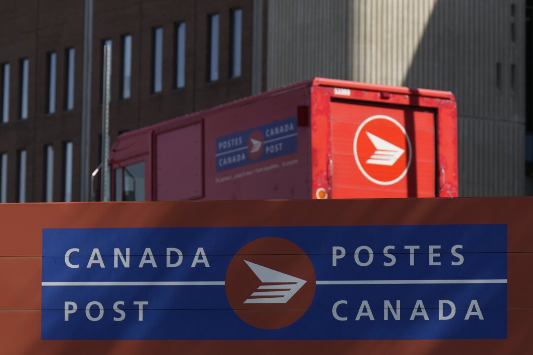 Cover image for Canada Post Moves Ahead With Plans to Cut Home Delivery