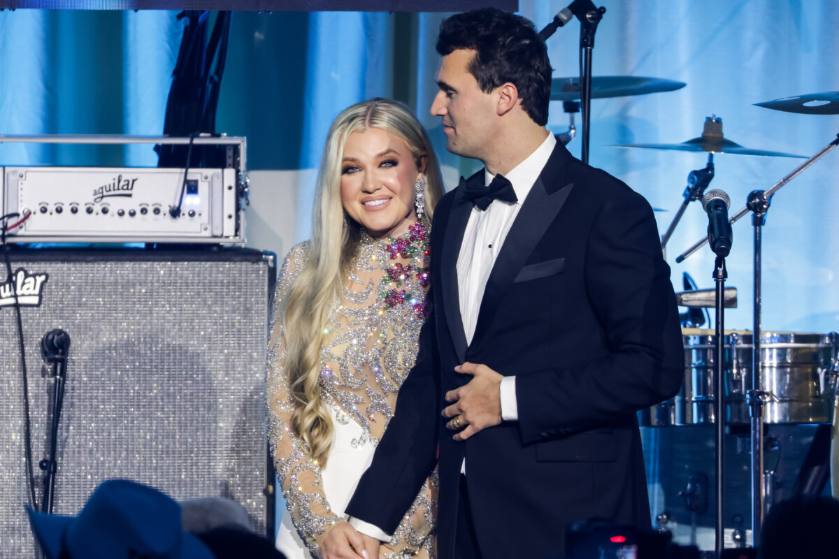 Charlie Kirk and his wife, Erika Lane Frantzve, on stage during the Turning Point USA Inaugural-Eve Ball at the Salamander Hotel in Washington on Jan. 19, 2025. (Samuel Corum/Getty Images)