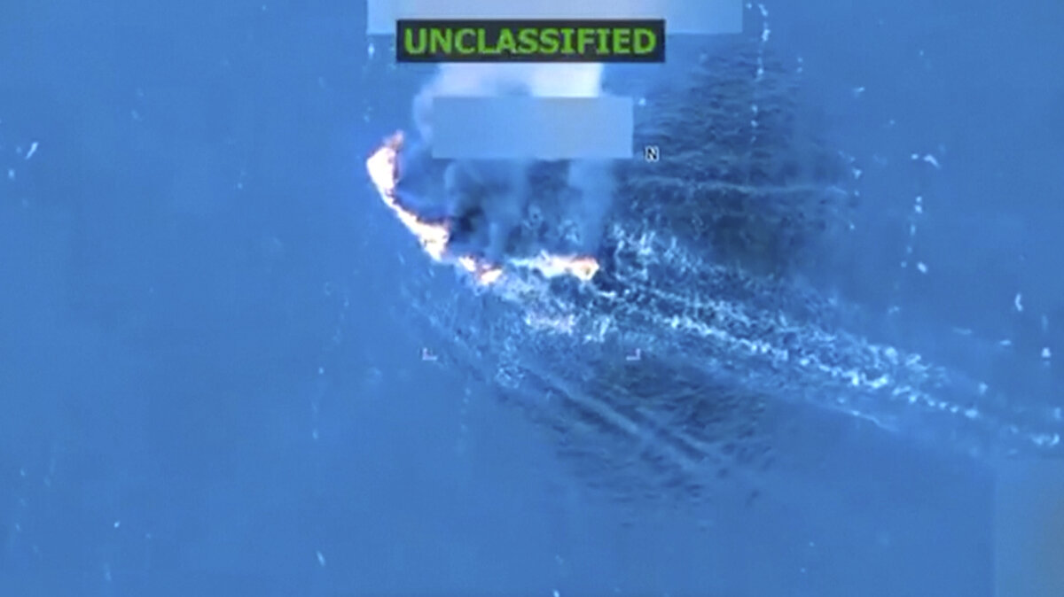 A drug cartel vessel burns following a U.S. military strike, the third such strike carried out against a suspected drug boat in recent weeks, in a still from video released on Sept. 19, 2025. (President Donald Trump via Truth Social via Reuters)