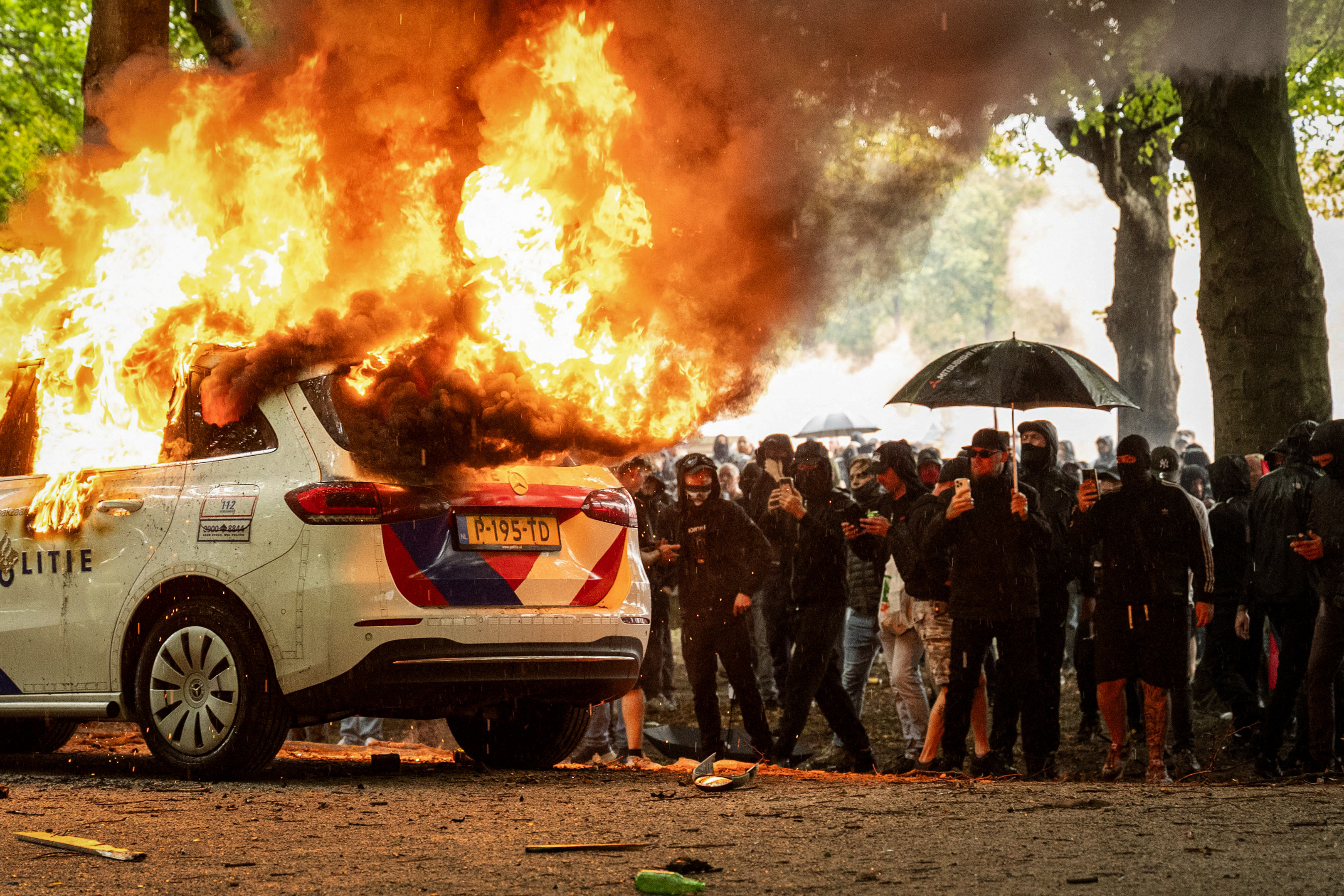 Day in Photos: Anti-Migrant Protests, Military Parade in Belgrade, and Normandy Beach Race