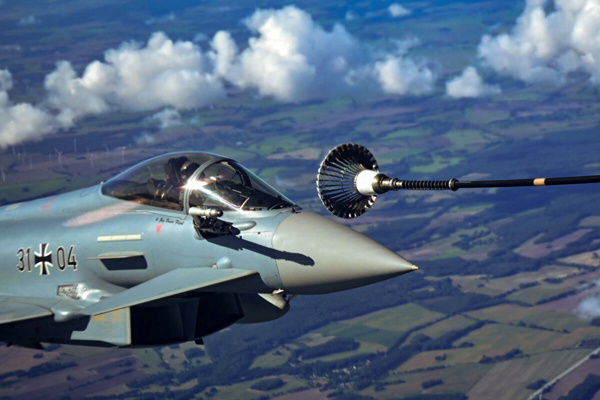 A German Air Force Eurofighter Typhoon refueling in flight during a demonstration at the military air base in Laage, Germany, on Sept. 23, 2025. (Tobias Schwarz/AFP via Getty Images)