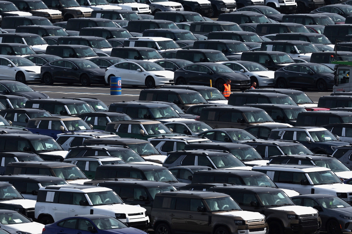 New cars, imported or waiting to be exported, are parked in the port of Zeebrugge, Belgium, on July 18, 2025. (Yves Herman/Reuters)